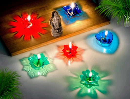 TrifleArte Pack of 12 Assorted 3D Floating Diyas – Swastik, OM, Star, Sun, Flower – Reusable & Colourful Oil Lamps